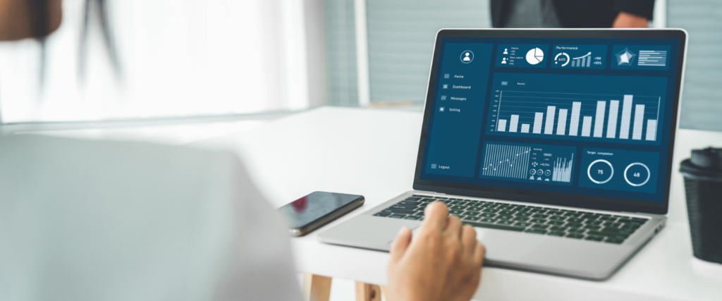 worker with dashboard on laptop