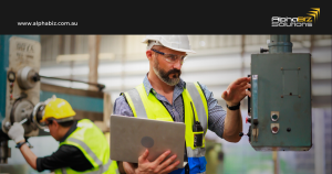 manufacturer checking CADTalk dashboard on laptop