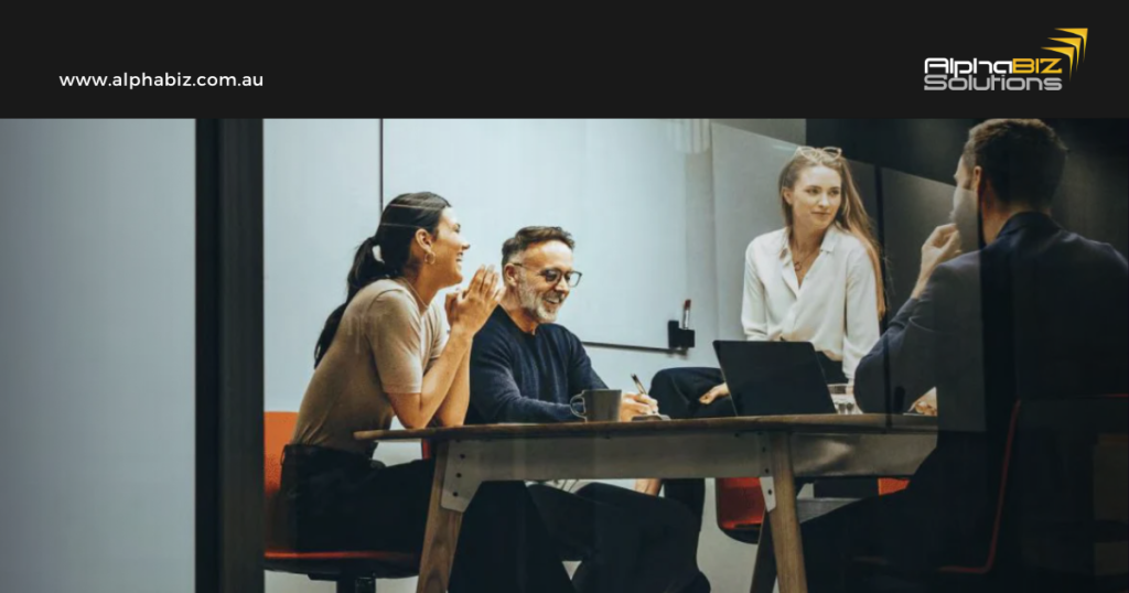 Managers discussing Eyeing Growth Why Australia’s Mid-Market Is Confident About 2026